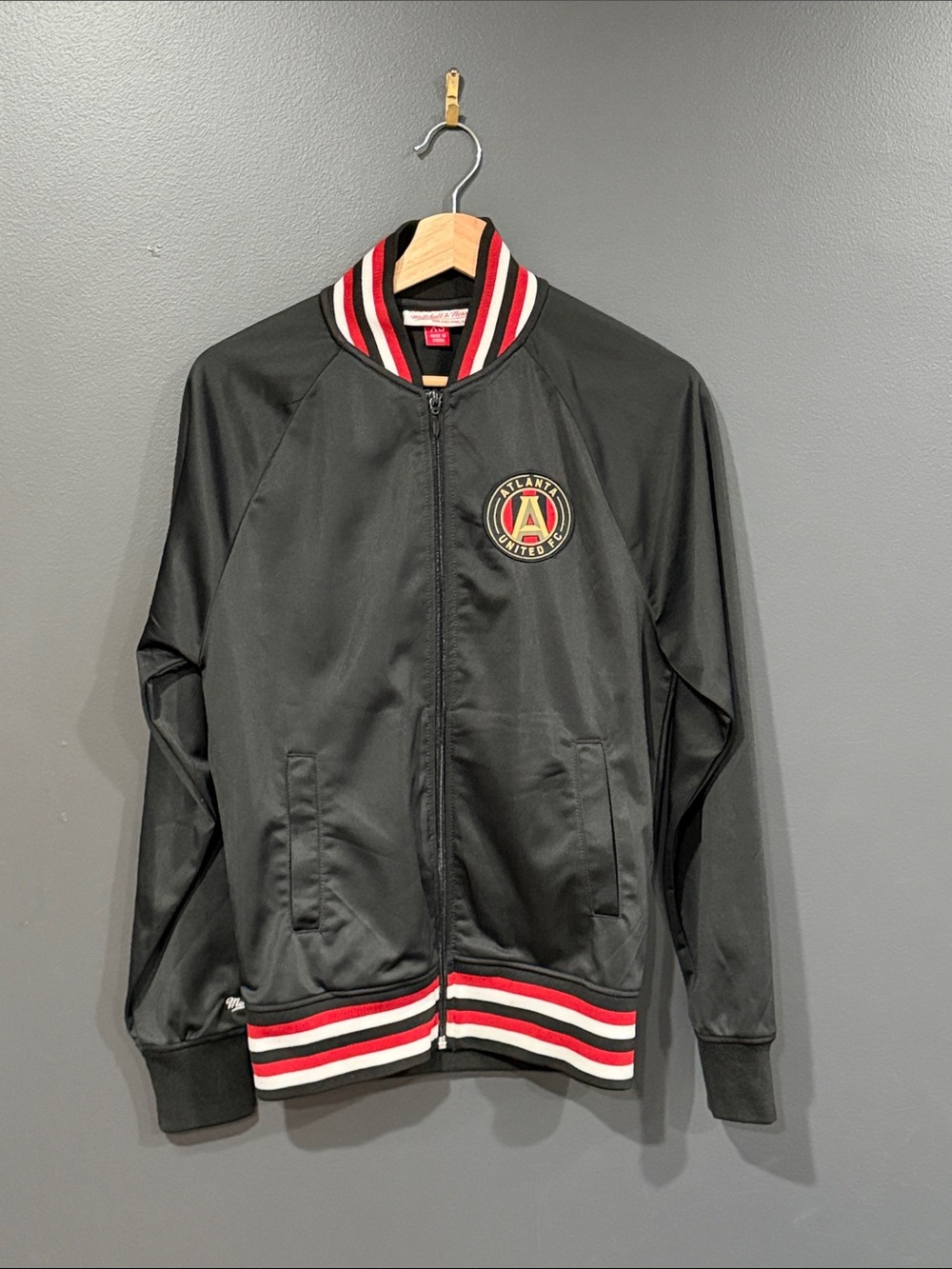 Mitchell & Ness Atlanta United Black Bomber Jacket with Red & White Trim
